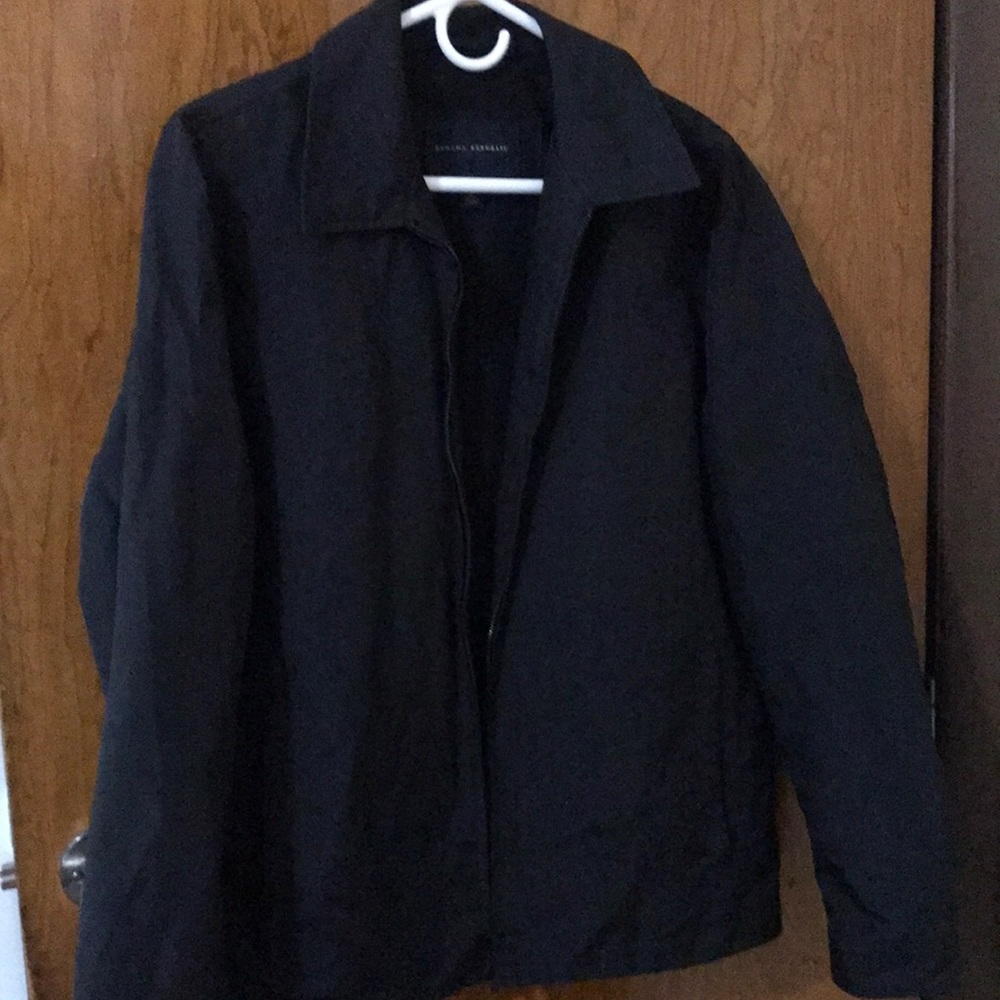 Black jacket with grey interior lining and  pockets